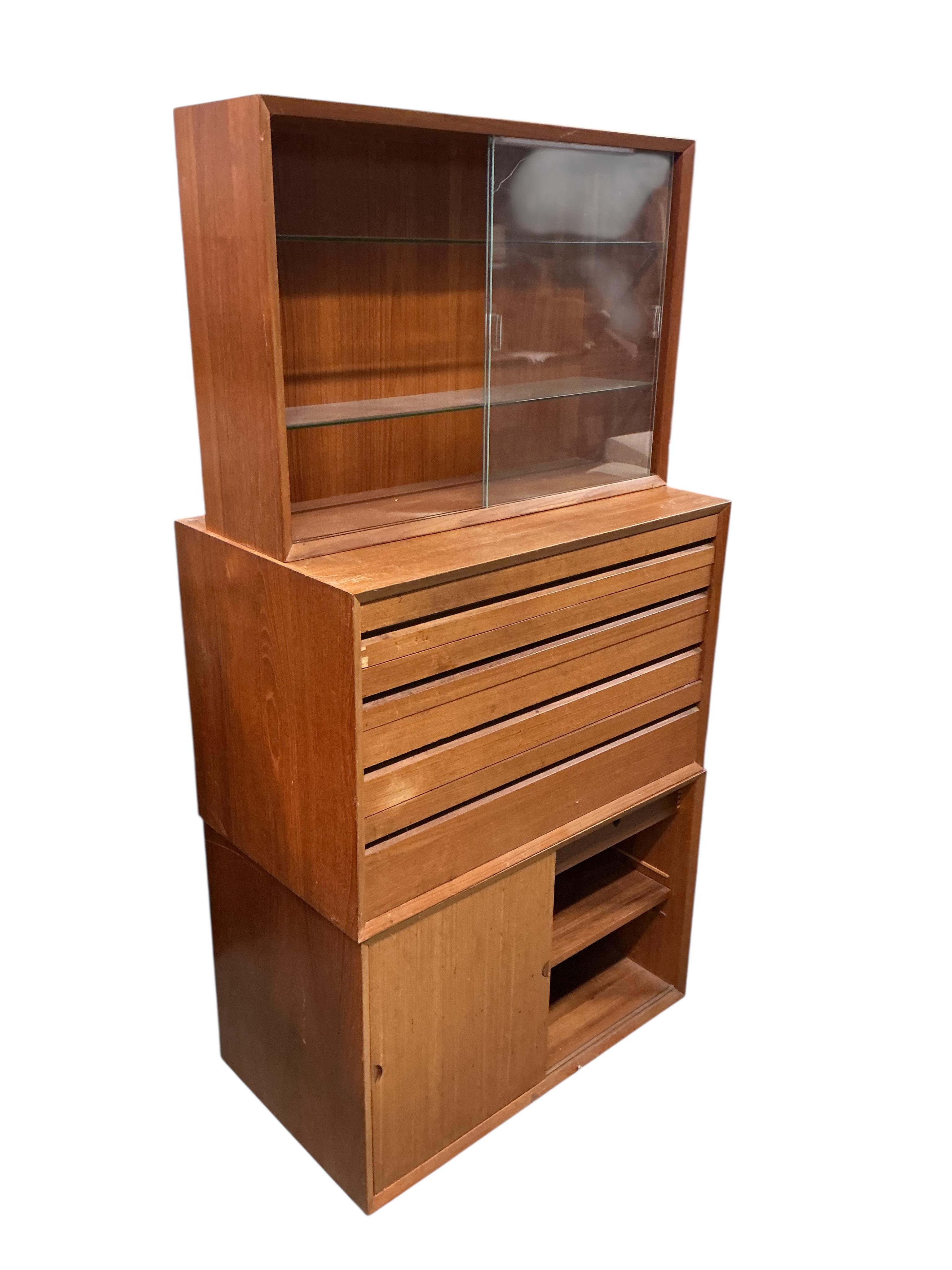 A Poul Cadovius Royal System teak three section wall system, width 80cm, depth 46cm, height 159cm